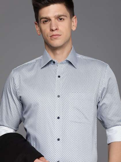Raymond Pure Cotton
                        Slim Fit Geometric Printed Formal Shirt