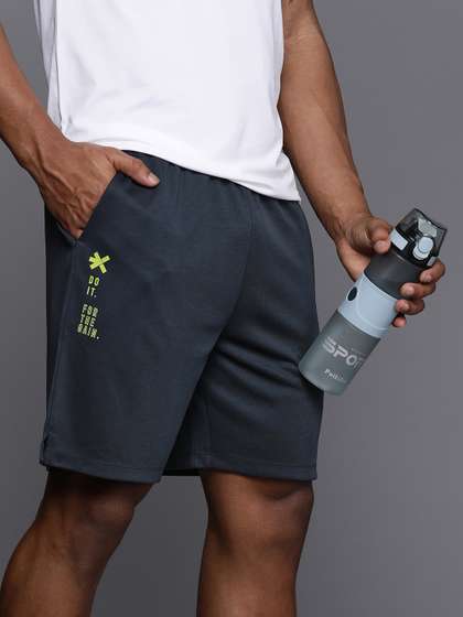 HRX by Hrithik
                        Roshan Men Rapid Dry Training Shorts