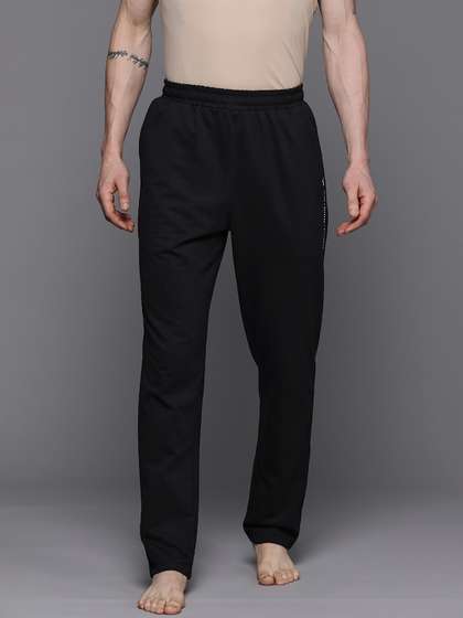 HRX by Hrithik
                        Roshan Men Wellness Finish Yoga Track Pants