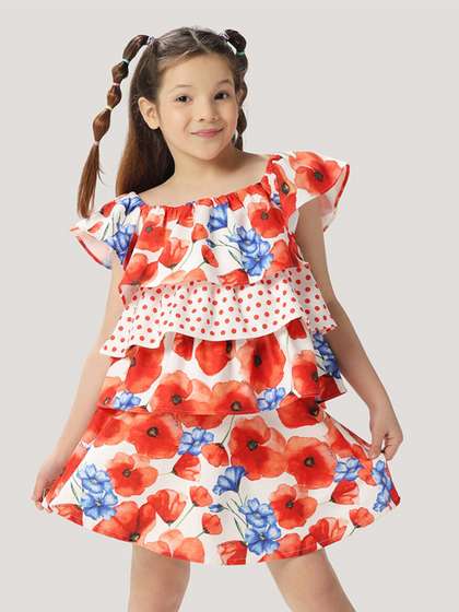 One Friday Girls
                      Floral Printed Off Shoulder Top With Frills