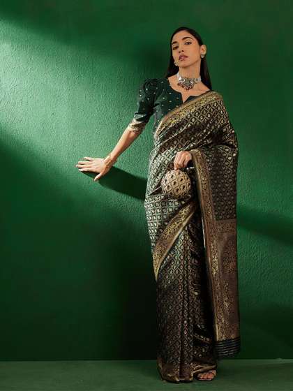 Sangria Green Ethnic
                        Motifs Woven Design Zari Banarasi Saree