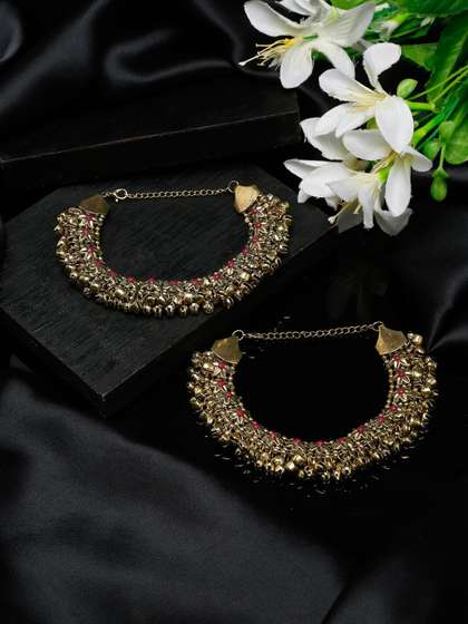 Sangria Set Of 2
                          German Silver Gold-Plated Oxidised Tribal
                          Anklets