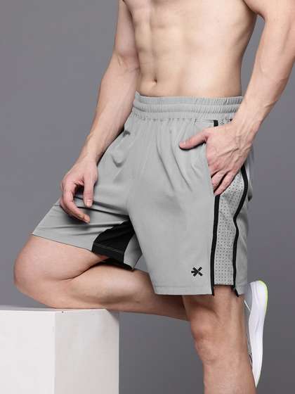 HRX by Hrithik
                        Roshan Men Self Design Sports Shorts