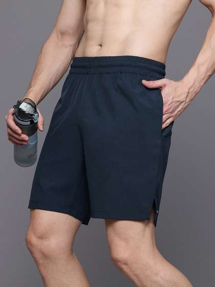HRX by Hrithik
                        Roshan Men Solid Sports Shorts