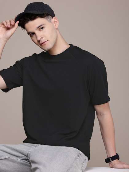 FCUK Premium Men
                        Textured Solid Oversized T-shirt