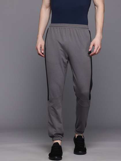 HRX by Hrithik Roshan Men Mid-Rise Regular Fit Lifestyle Joggers with Side Stripe