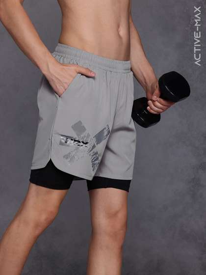 HRX by Hrithik
                        Roshan Men Brand Logo Printed Double Layer Gym
                        Shorts