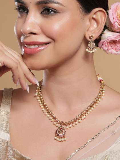 Rubans 22KT
                        Gold-Plated Kundan and Cubic Zirconia Studded
                        Jewellery Set