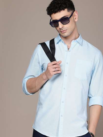 Roadster Men Solid
                        Premium Regular Fit Shirt