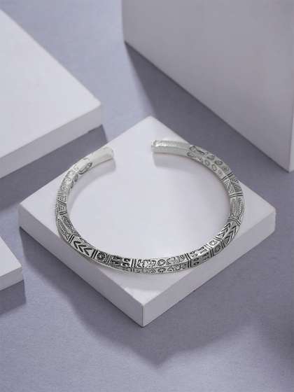 Yellow Chimes Stainless
                    Steel Rhodium-Plated Cuff Bracelet