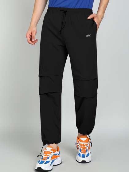 HRX by Hrithik
                        Roshan Men Mid-Rise Parachute Track Pants