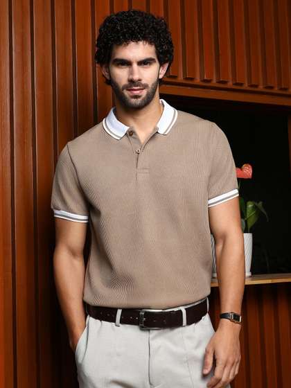 Campus Sutra Men
                        Self Design Polo Collar Cotton T-shirt