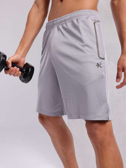 HRX by Hrithik
                        Roshan Men Mid-Rise Brand Logo Detail Rapid-Dry
                        Training Shorts