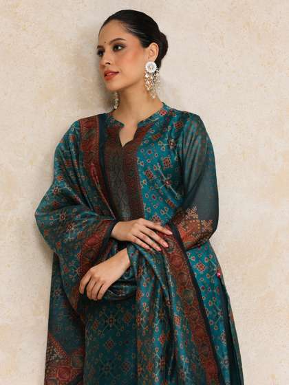 Varanga Women
                          Printed Regular Chanderi Silk Kurta with
                          Trousers & With Dupatta