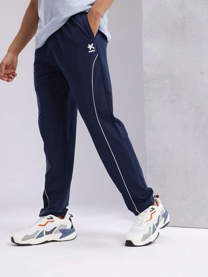 HRX by Hrithik
                        Roshan Men Contrast Piping Mid-Rise Lifestyle
                        Track Pants