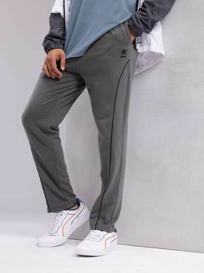 HRX by Hrithik
                        Roshan Men Contrast Piping Mid-Rise Lifestyle
                        Track Pants