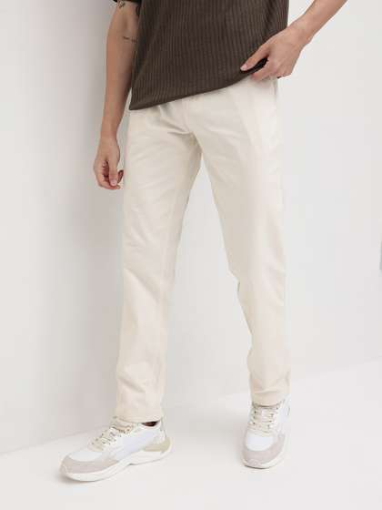 R.Code by The
                        Roadster Life Co. Men Solid Regular Fit Mid Rise
                        Trousers