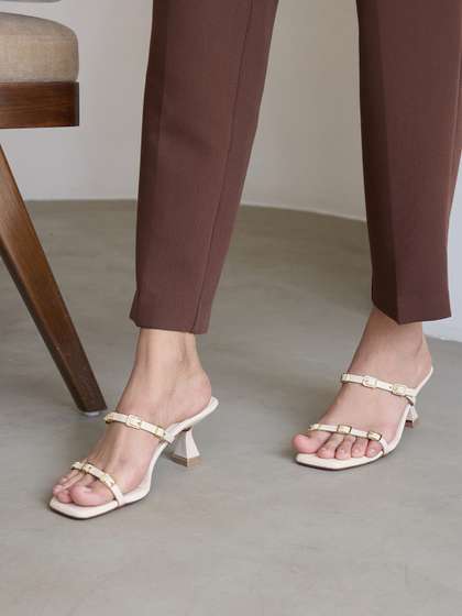 CAI Multi Buckled
                        Cream Heels