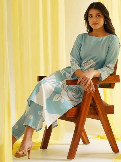 KALINI Women Floral
                        Printed Regular Kurta with Trousers
