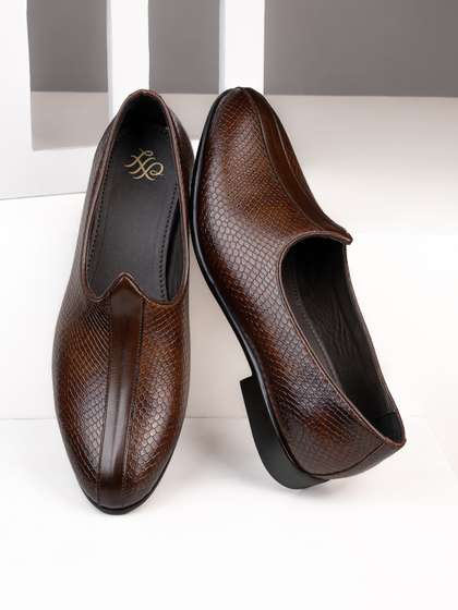 House of Pataudi
                          Men Textured Formal Slip-Ons