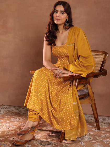 Libas Womens
                          Mustard Printed Rayon Anarkali Kurta With
                          Churidar & Dupatta
