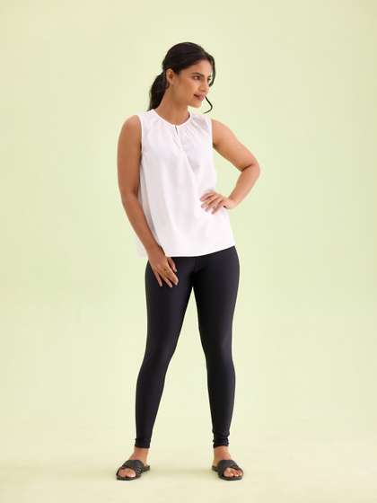 Go Colors Women
                        Black Solid Skinny Fit Shimmer Ankle-Length
                        Leggings