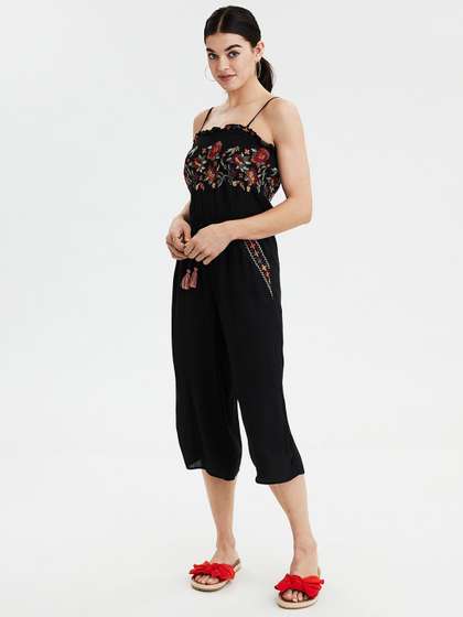 black jumpsuit with shrug