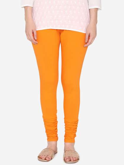Vami Women Orange
                          Solid Churidar-Length Leggings