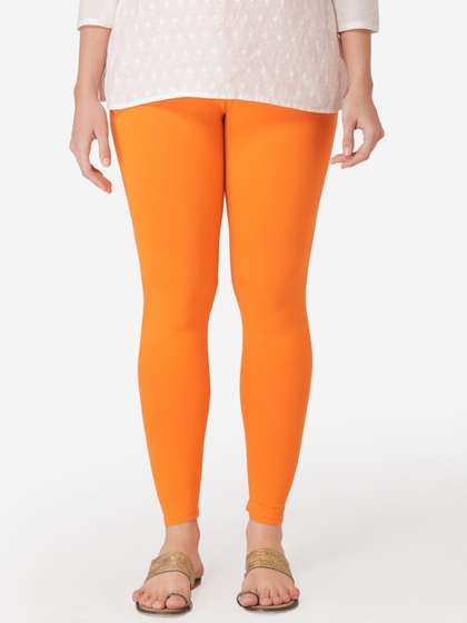 Vami Women Orange
                        Solid Cropped Leggings