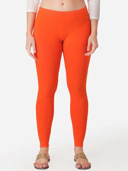 Vami Women Orange
                        Solid Ankle-Length Leggings