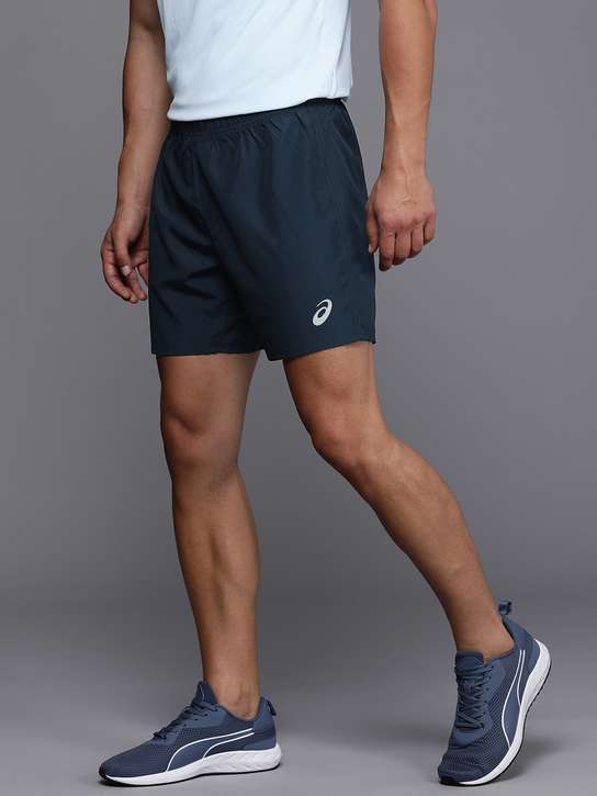 ASICS Men Solid Mid-Rise Sports Shorts deal from myntra
