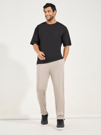 Buy Styli Men Pintuck Detail Velour Jogger with Embroidered