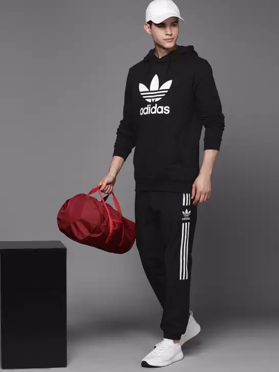 Men Solid Lock Up Joggers - image 6