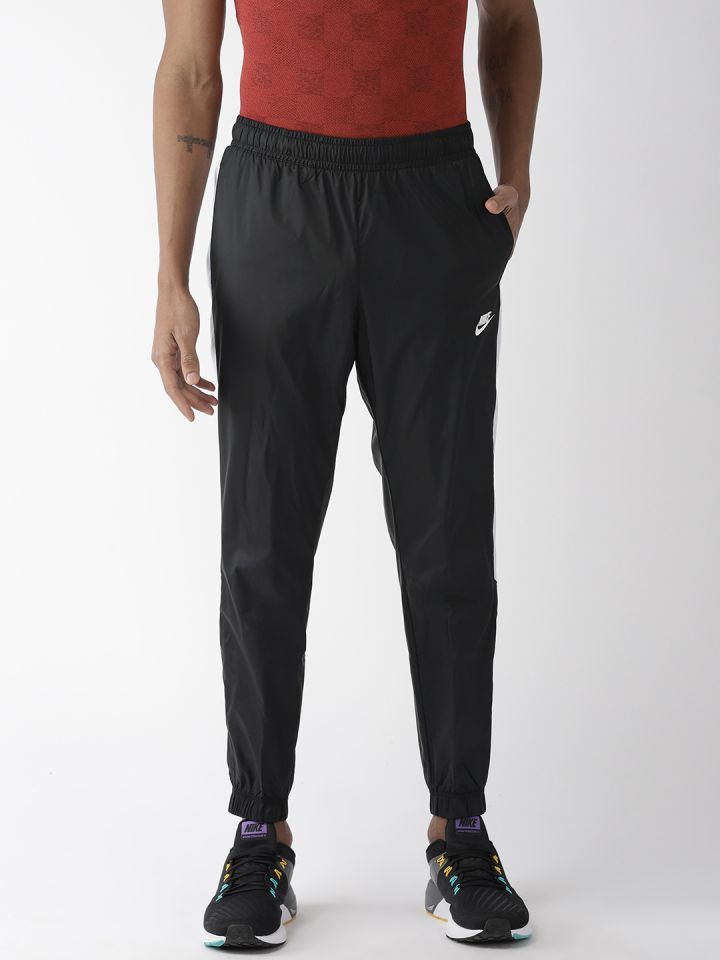 Buy Nike Men Black Loose Fit AS NSW CE CF CRE TK Solid Track Pants