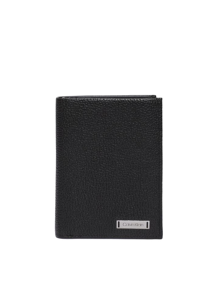 Buy Calvin Klein Jeans Men Black Textured Three Fold Leather Wallet -  Wallets for Men 10143583 | Myntra