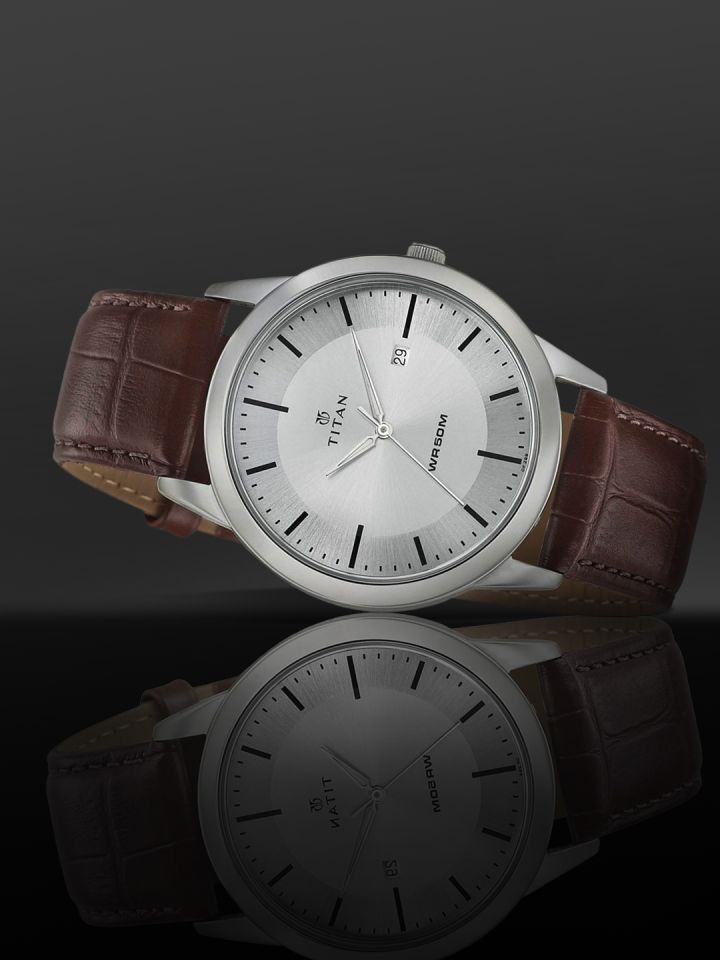 Titan watch sales 1584sae price