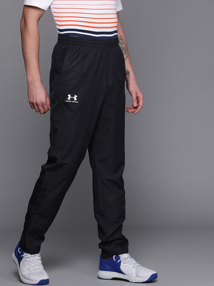 Buy UNDER ARMOUR Men Vital Woven Solid Track Pants - Track Pants