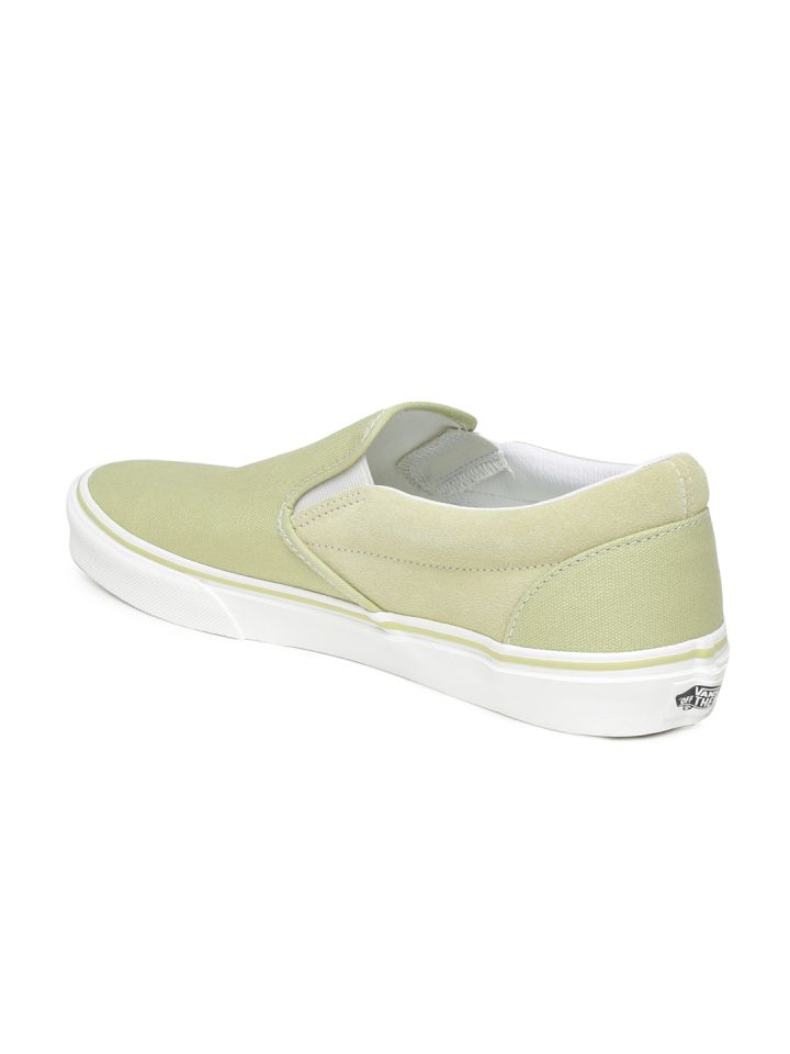 Pastel yellow slip on top vans