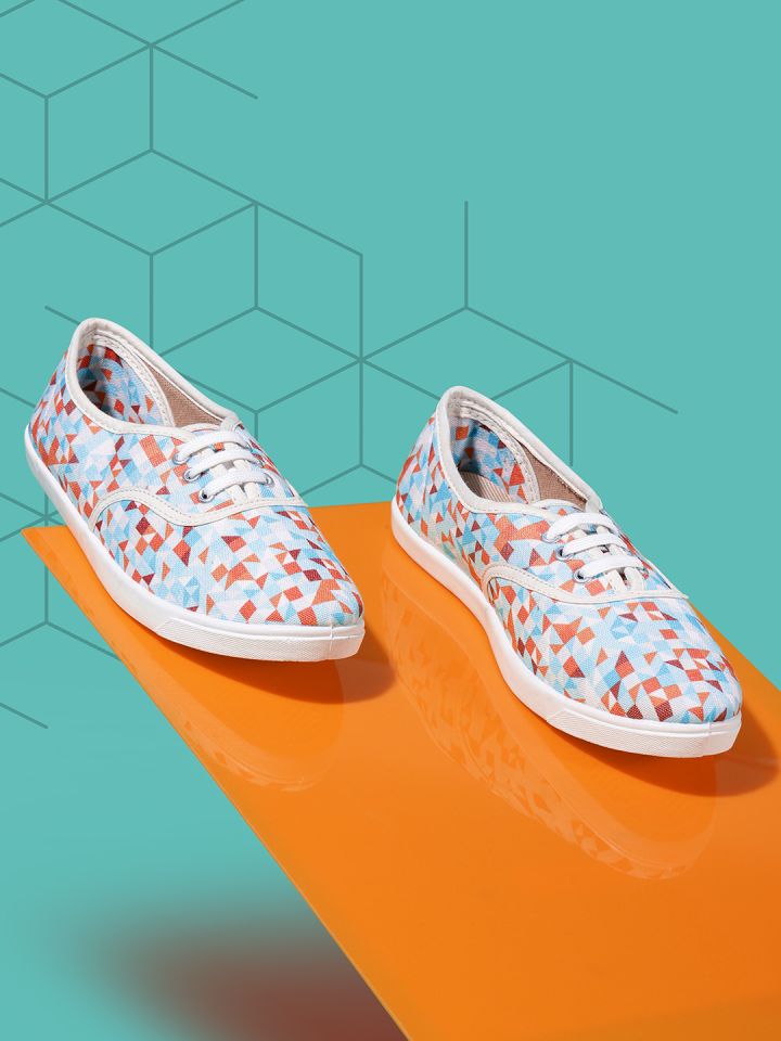 Teal and outlet orange sneakers