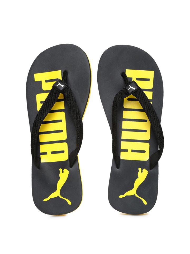 Puma black 2025 and yellow slippers