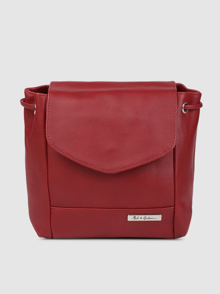 red sling backpack