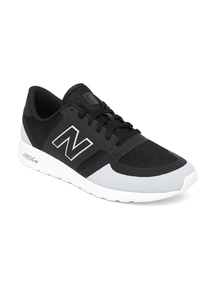 solid black new balance shoes
