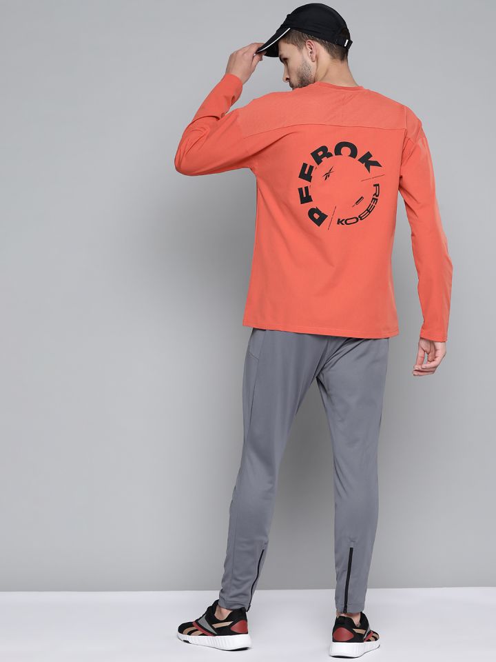 Orange hot sale reebok shirt