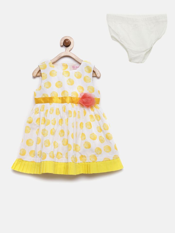 white dress with yellow polka dots