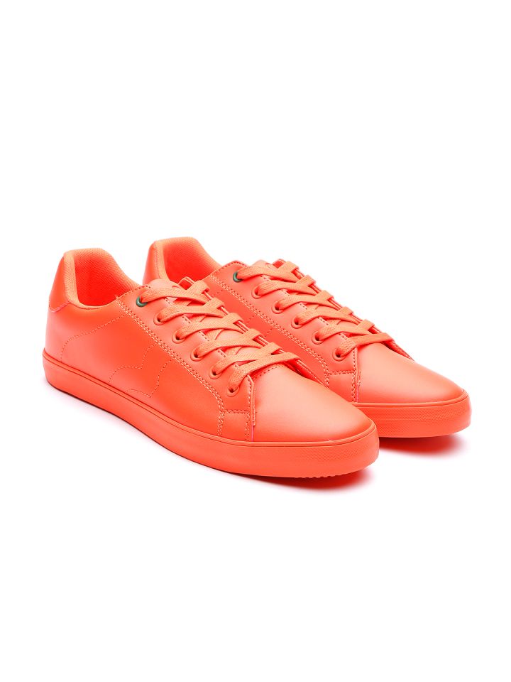 Ucb top orange sneakers