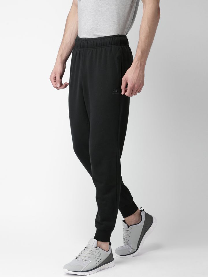 Buy New Balance Black Joggers Track Pants for Men 1813281 Myntra