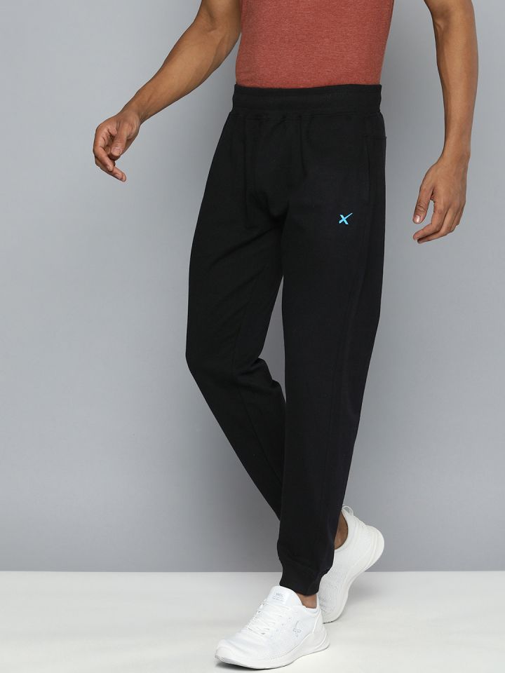 Buy HRX By Hrithik Roshan Men Black Solid Rapid Dry Running Joggers - Track  Pants for Men 7610386 | Myntra