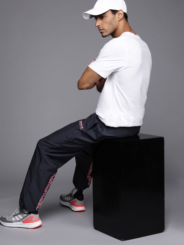 Adidas originals joggers with lock up logo in navy deals