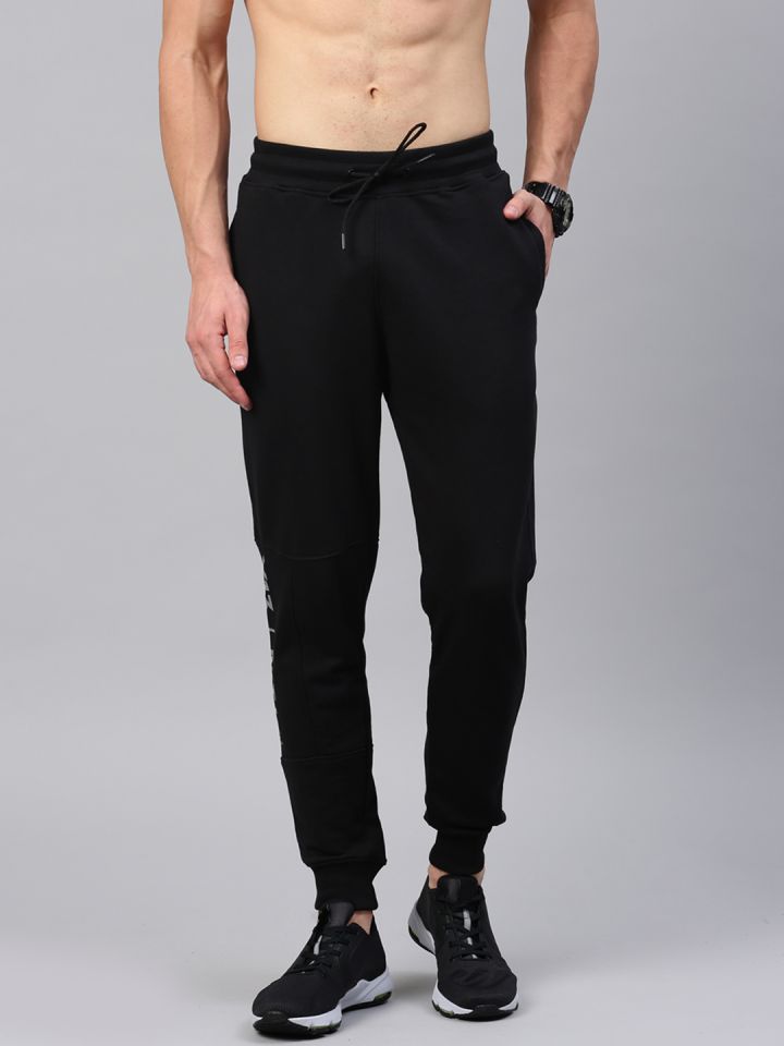 Buy HRX By Hrithik Roshan Men Jet Black Solid Regular Fit Bio Wash