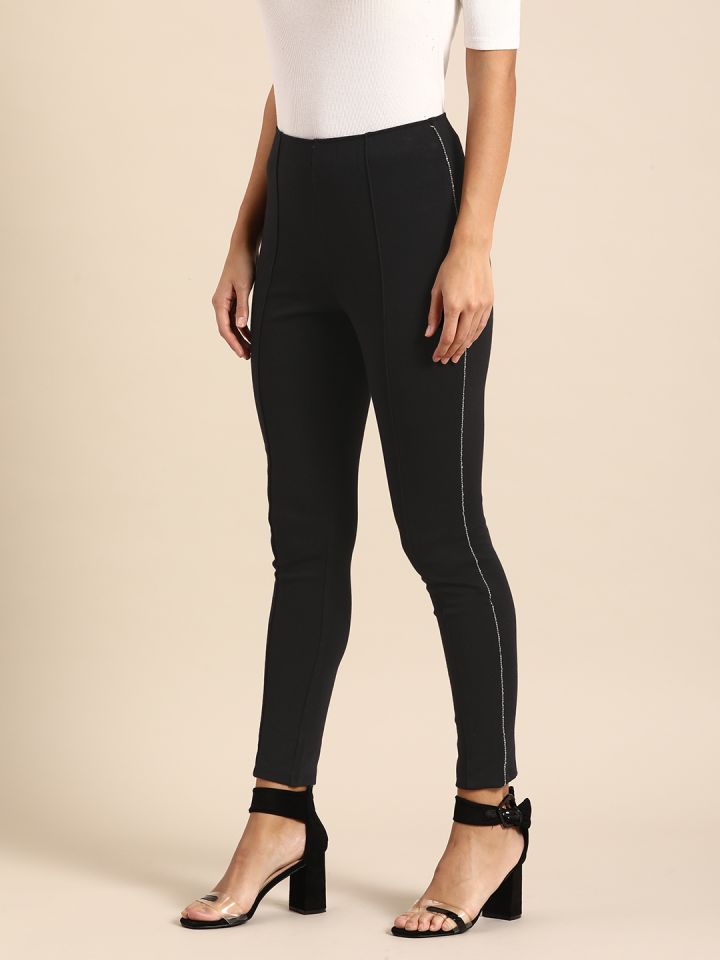 all about you Women Black Solid Jeggings with Embellished Tape Detail
